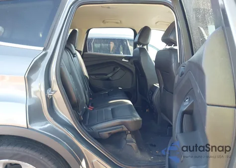 2014 Ford Escape Titanium z USA, uszkodzony, nr VIN 1FMCU9J99EUD78865